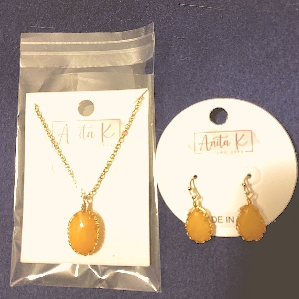 NWT. Hand crafted semi precious Necklace and earrings set.